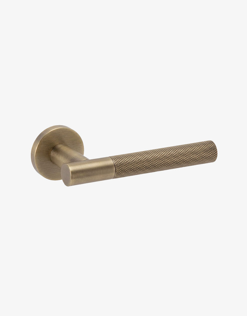 Ibiza door handle set on round rose
