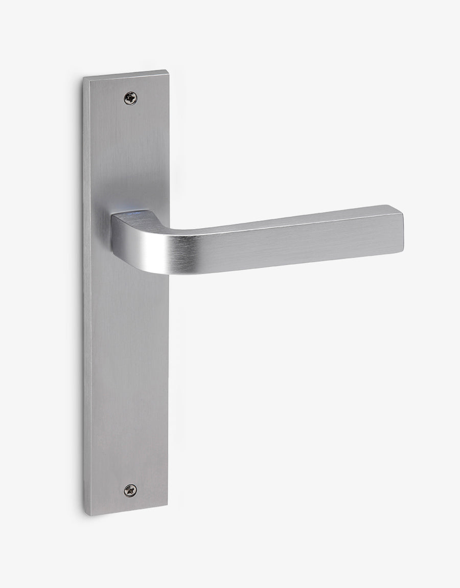 Touch lever handle set on a rectangular backplate